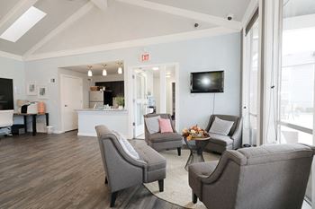 Image of clubhouse with chairs, kitchenette, and television.  at Bennett Ridge Apartments, Oklahoma City, OK, 73132